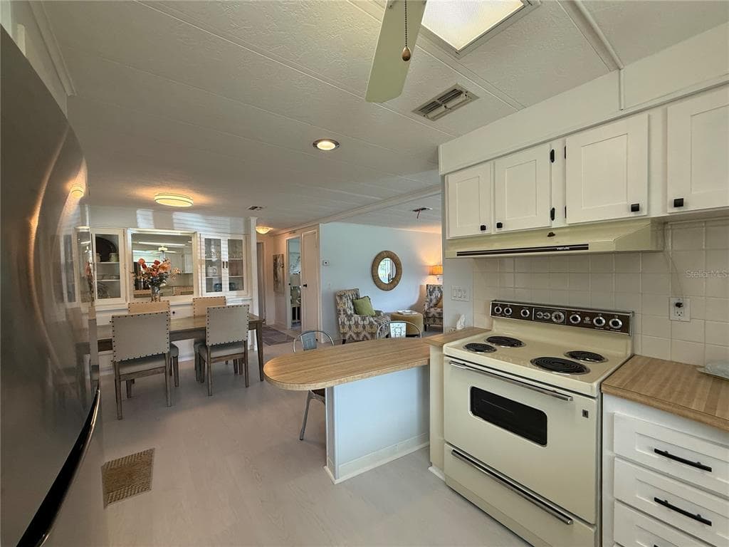 11 N BOBWHITE ROAD, WILDWOOD, FL 34785 — zdjęcie 4
