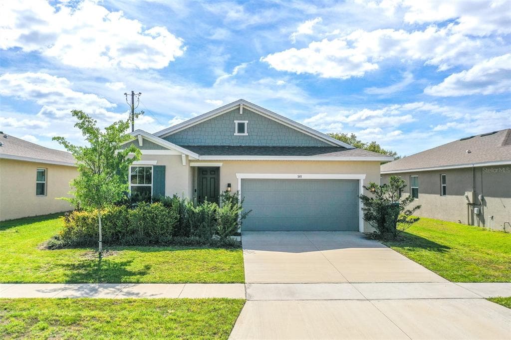 148 HILLTOP BLOOM LOOP, HAINES CITY, FL 33844