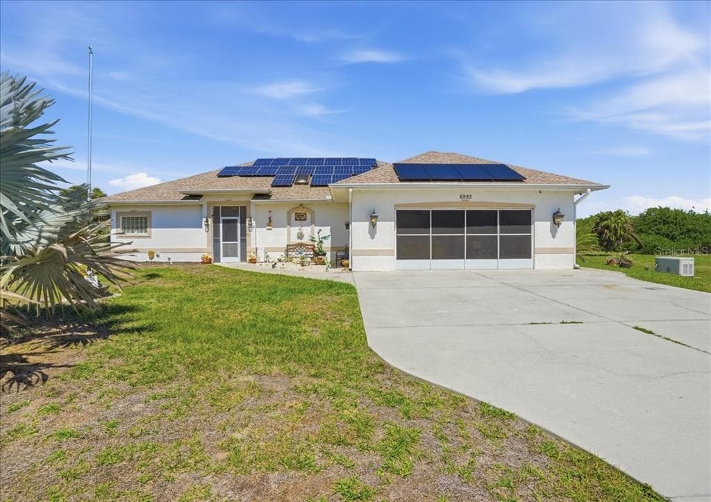 6993 MANNIZ ROAD, PORT CHARLOTTE, FL 33981