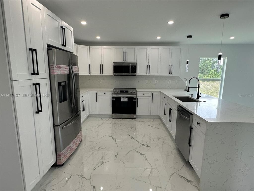 1125 MILWAUKEE BOULEVARD, LEHIGH ACRES, FL 33974 — zdjęcie 3