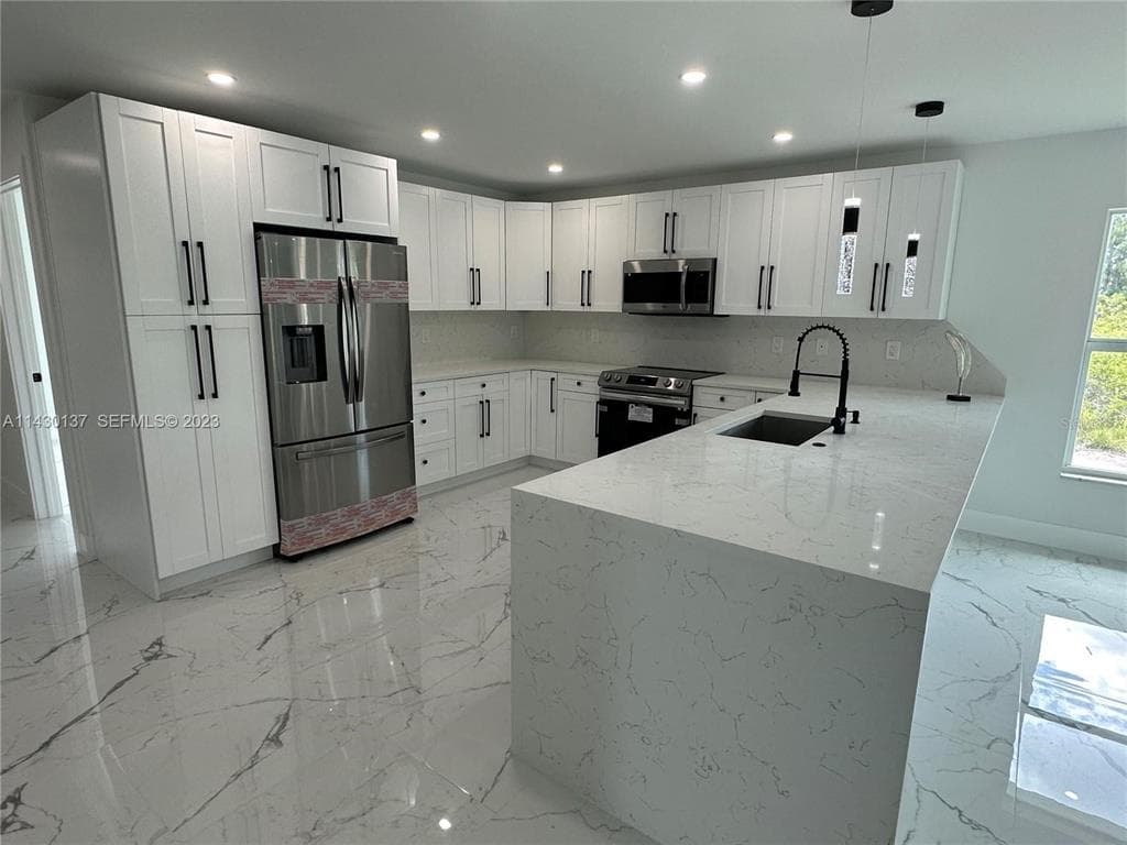 1125 MILWAUKEE BOULEVARD, LEHIGH ACRES, FL 33974 — zdjęcie 4