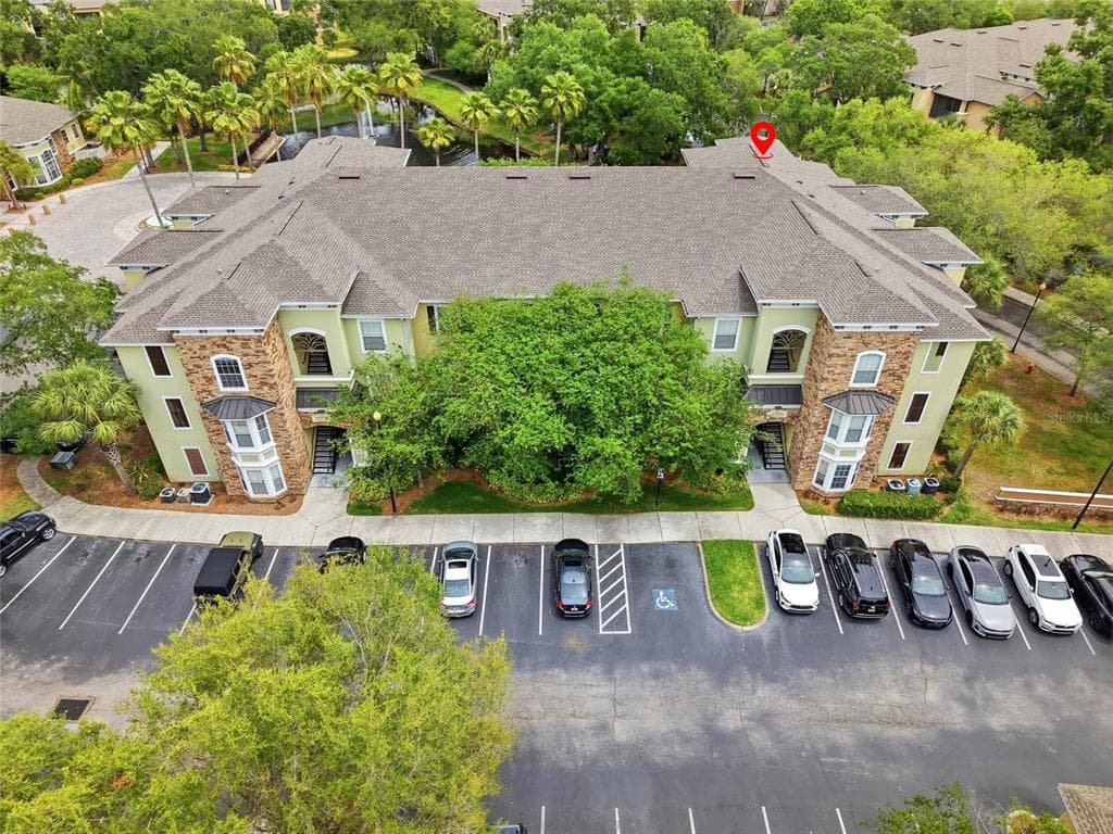 9916 COURTNEY PALMS BOULEVARD # 302, TAMPA, FL 33619