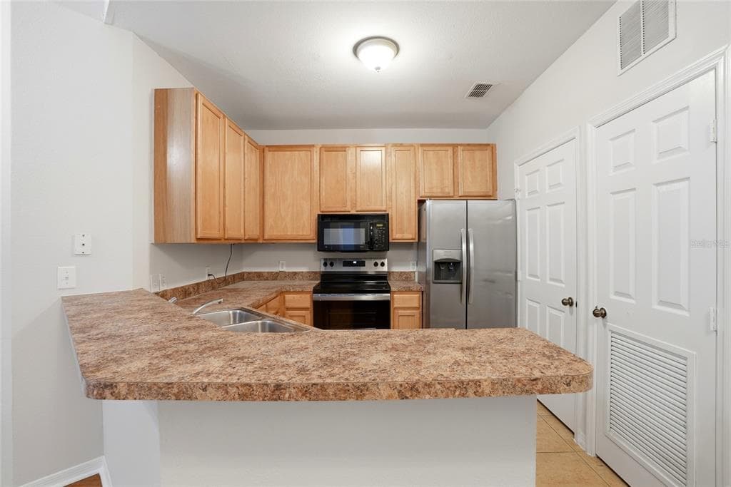 9916 COURTNEY PALMS BOULEVARD # 302, TAMPA, FL 33619 — zdjęcie 5