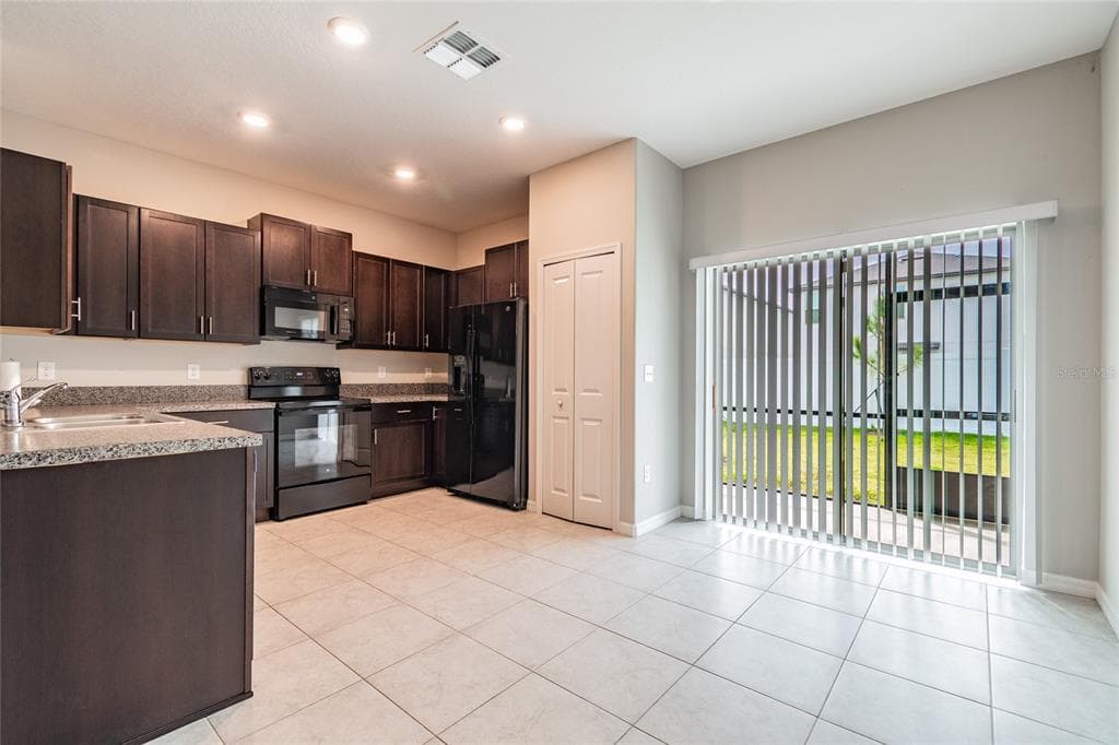 7221 SWEET ALYSSUM COURT, TAMPA, FL 33619 — zdjęcie 3