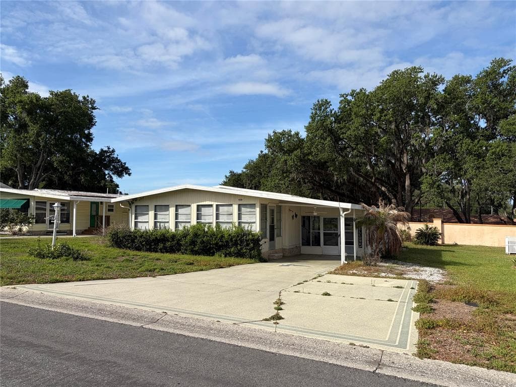 930 TARRSON BOULEVARD, LADY LAKE, FL 32159