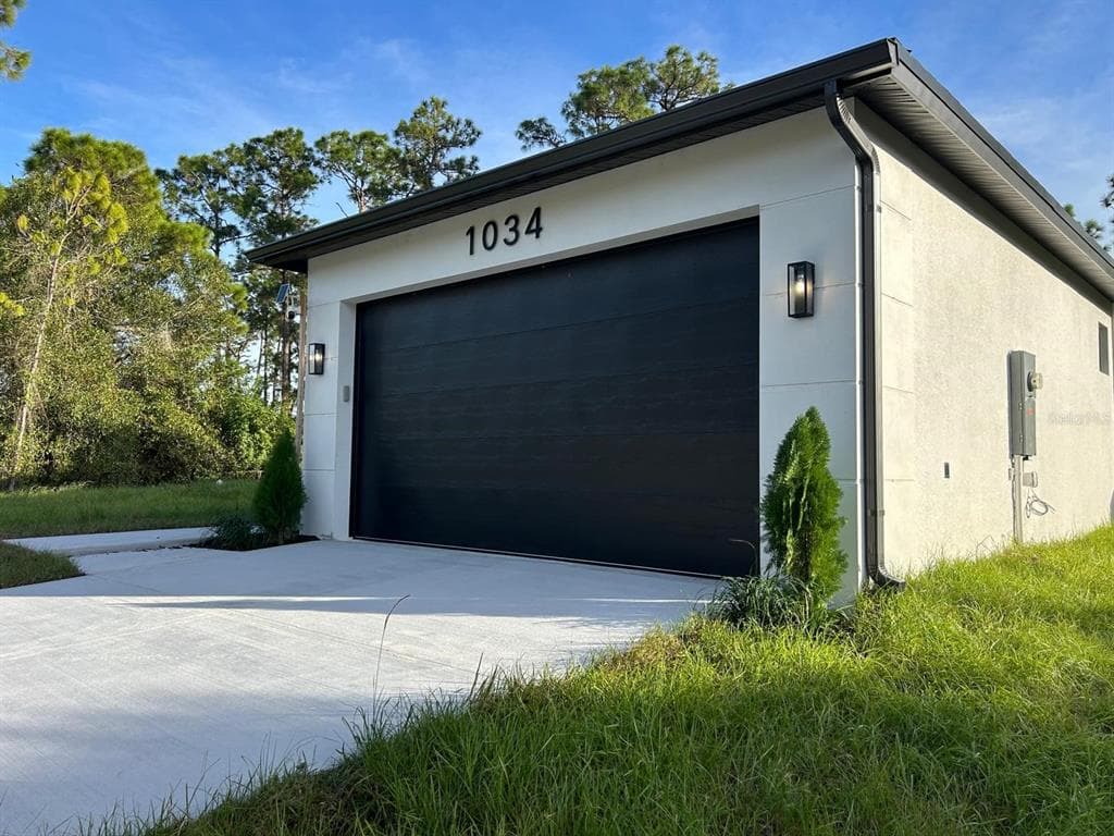 1034 ALCALDE STREET E, LEHIGH ACRES, FL 33974 — zdjęcie 3