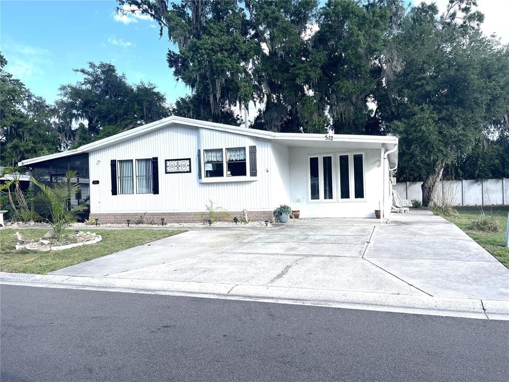 312 S TIMBER TRL, WILDWOOD, FL 34785 — zdjęcie 2