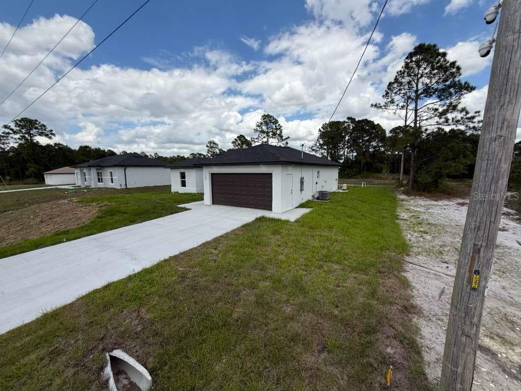 765 PUCCINI AVE S, LEHIGH ACRES, FL 33974 — zdjęcie 2