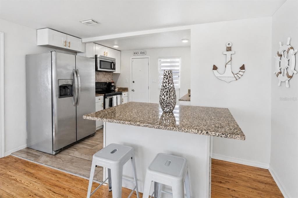 7799 46TH AVE N, ST PETERSBURG, FL 33709 — zdjęcie 4
