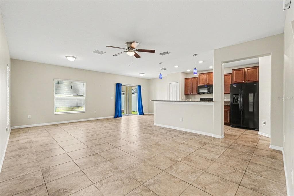 7421 FRENCH MARIGOLD AVENUE, TAMPA, FL 33619 — zdjęcie 4