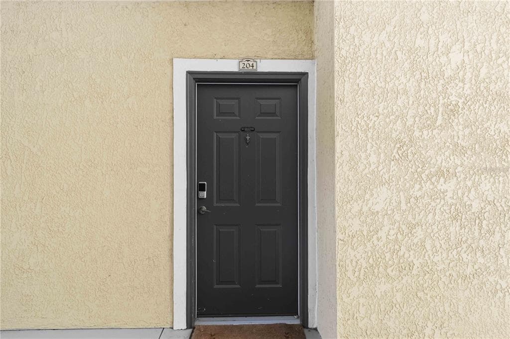 10201 COURTNEY PALMS BOULEVARD # 204, TAMPA, FL 33619 — zdjęcie 2
