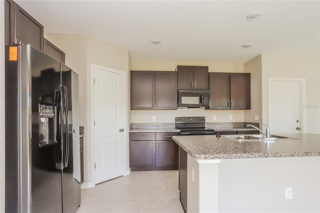 15519 WICKED STRONG STREET, SUN CITY CENTER, FL 33573 — zdjęcie 4