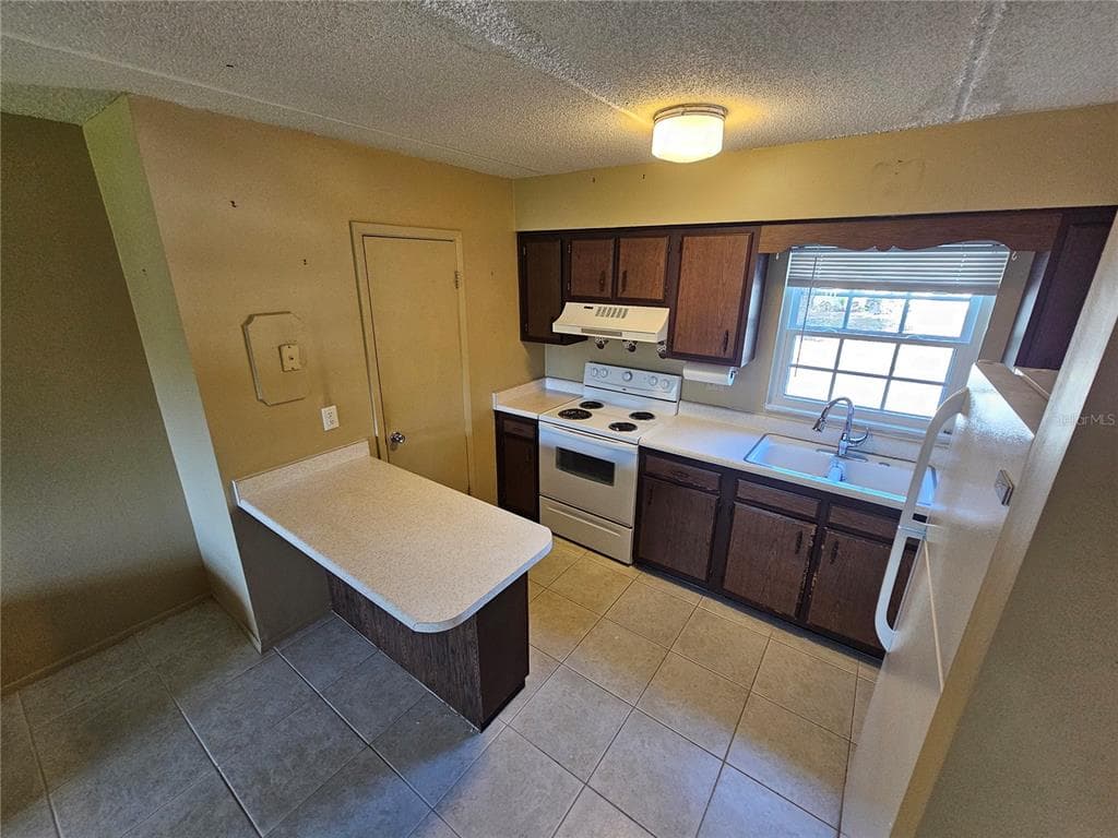 1100 E CAROLINE STREET # 123, TAVARES, FL 32778 — zdjęcie 5