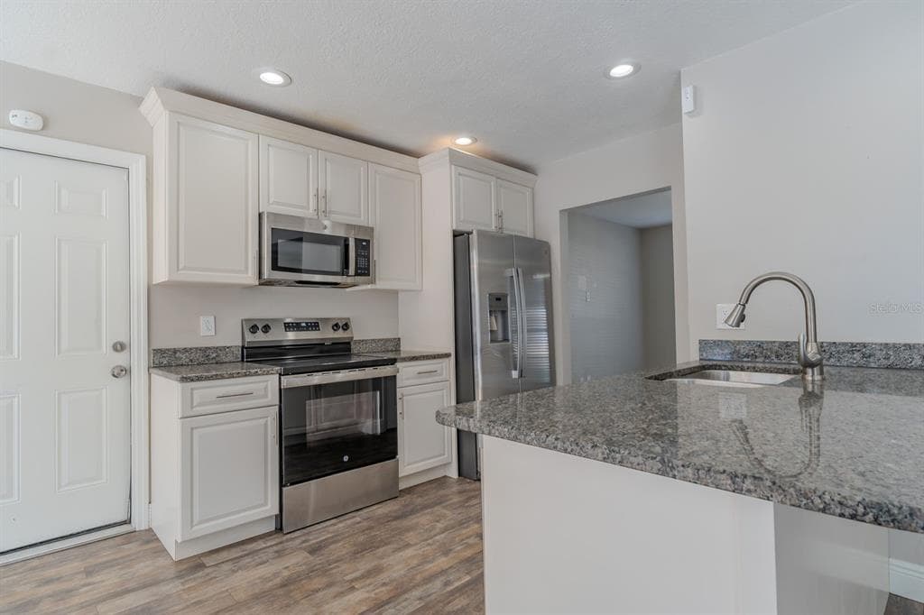 8018 W POCAHONTAS AVENUE, TAMPA, FL 33615 — zdjęcie 5