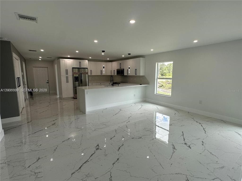 1125 MILWAUKEE BOULEVARD, LEHIGH ACRES, FL 33974 — zdjęcie 5