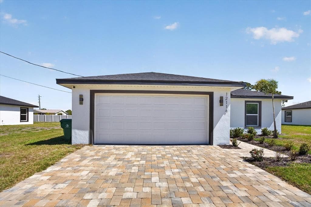 12114 CLARENDON AVENUE, PORT CHARLOTTE, FL 33981