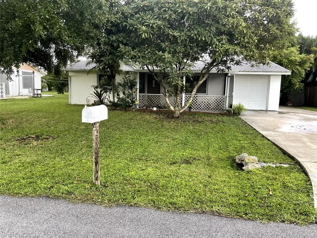 210 WALNUT AVENUE NW, PORT CHARLOTTE, FL 33952
