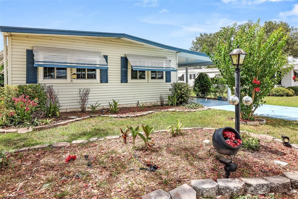 919 WEEPING WILLOW AVENUE, LADY LAKE, FL 32159