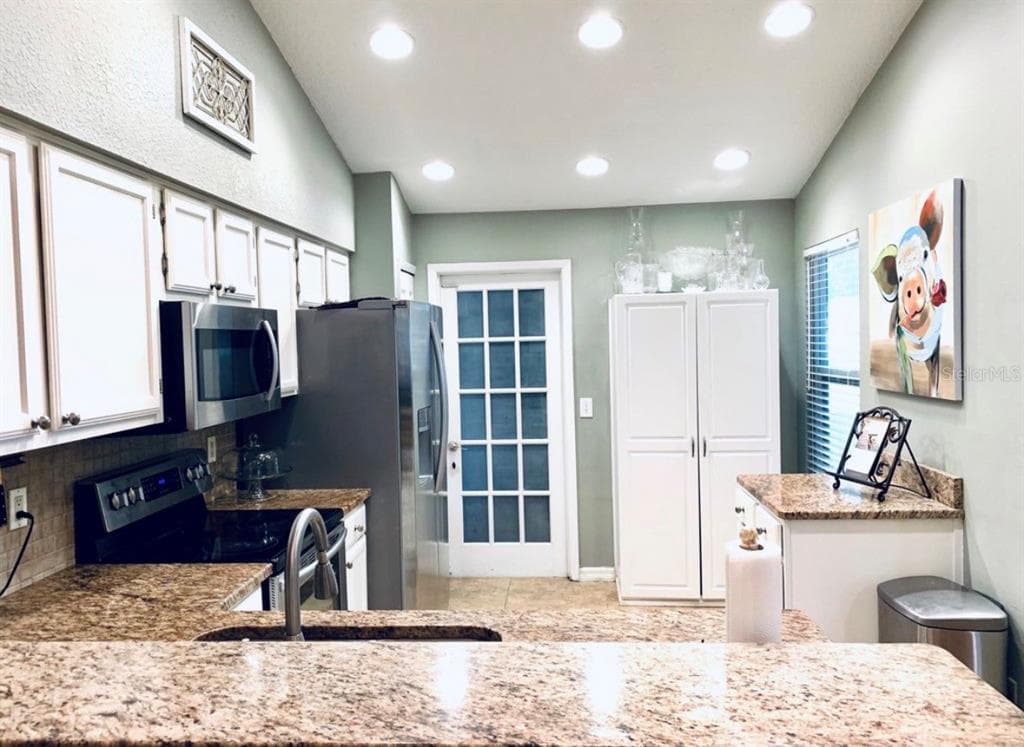 7333 RADIANT CIRCLE, ORLANDO, FL 32810 — zdjęcie 4