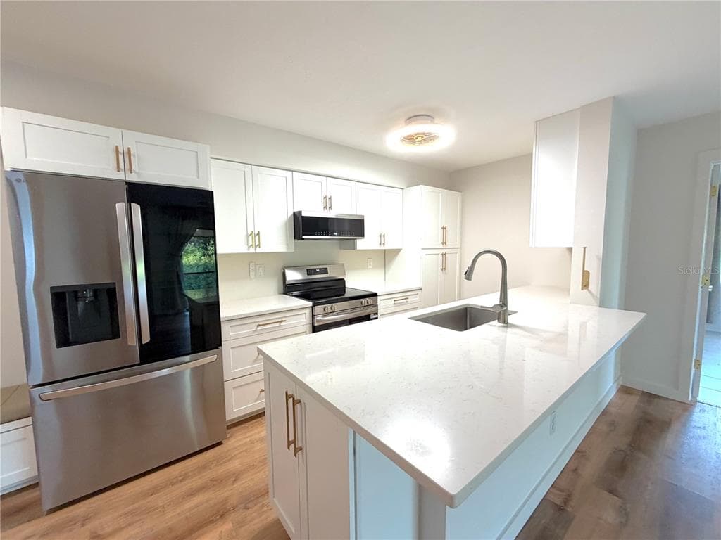 2067 HUNTERS GLEN DRIVE # 312, DUNEDIN, FL 34698 — zdjęcie 5