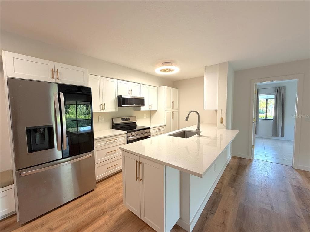 2067 HUNTERS GLEN DRIVE # 312, DUNEDIN, FL 34698 — zdjęcie 4