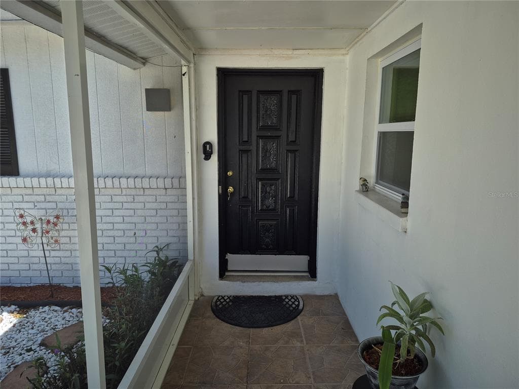 7709 W HANNA AVENUE, TAMPA, FL 33615 — zdjęcie 2