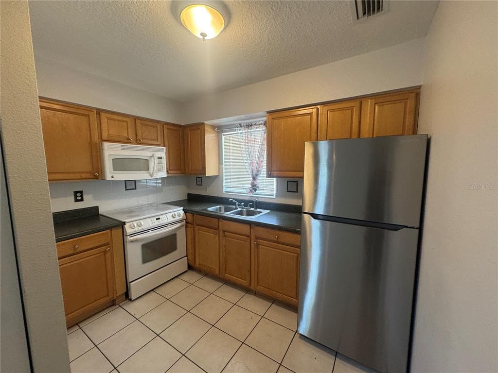 3607 W IDLEWILD AVENUE # 501, TAMPA, FL 33614 — zdjęcie 2