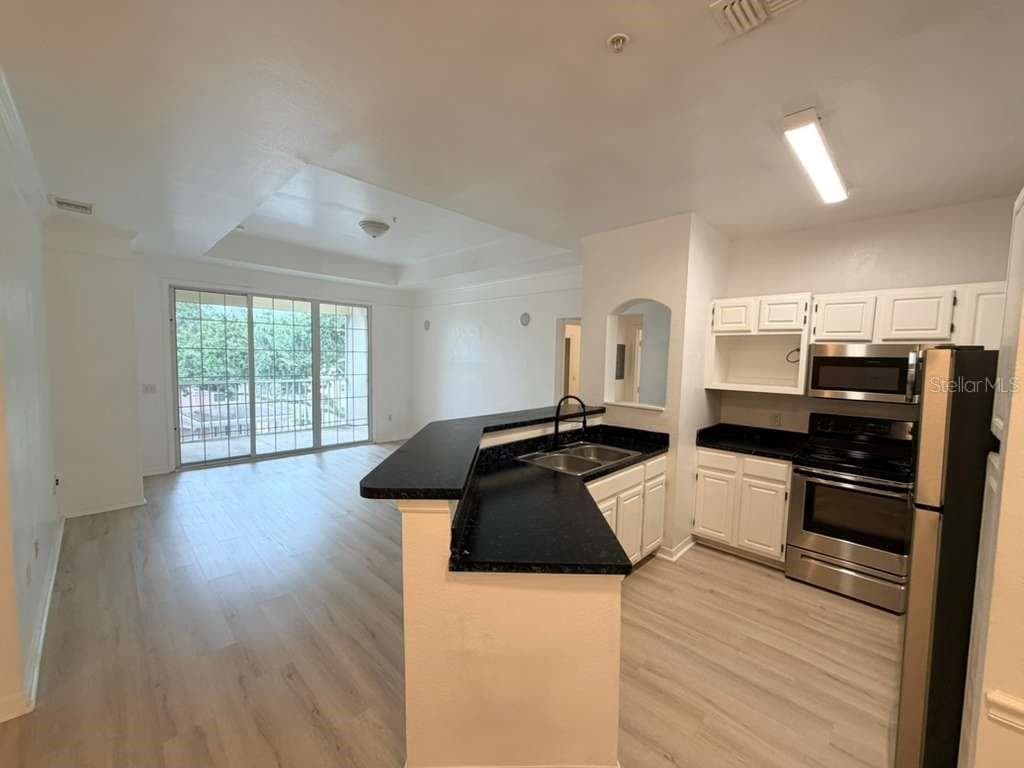 6413 ASTOR VILLAGE AVENUE # 301, ORLANDO, FL 32835 — zdjęcie 3