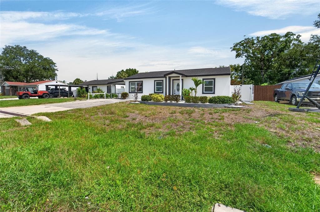 4711 W LAWN AVENUE, TAMPA, FL 33611 — zdjęcie 3