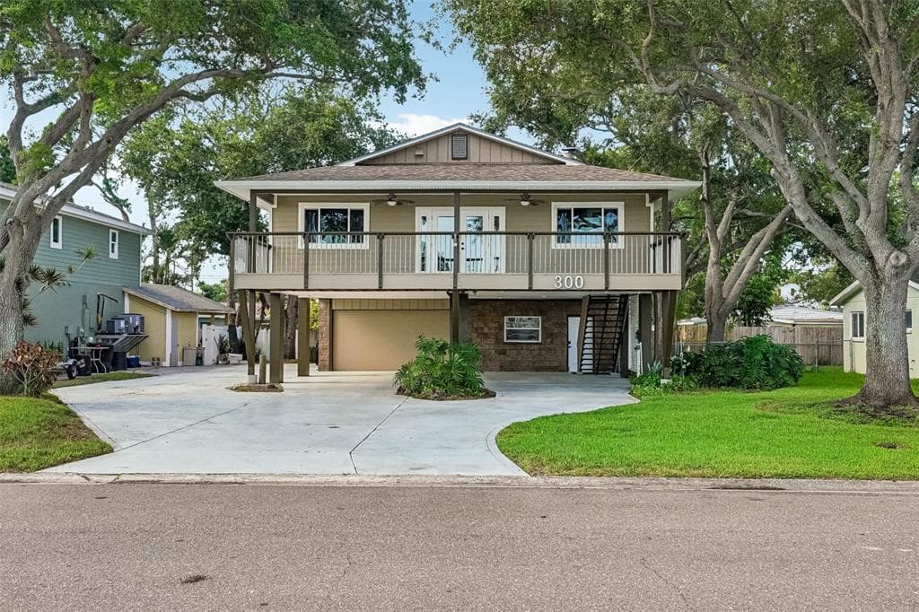 300 90TH AVENUE NE, ST PETERSBURG, FL 33702 — zdjęcie 4