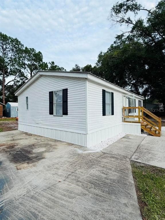 6734 RAVENWOOD STREET, ZEPHYRHILLS, FL 33544 — zdjęcie 4
