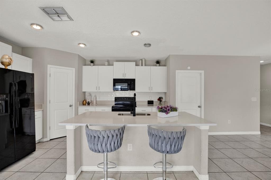 3707 DAISY BLOOM PLACE, TAMPA, FL 33619 — zdjęcie 5