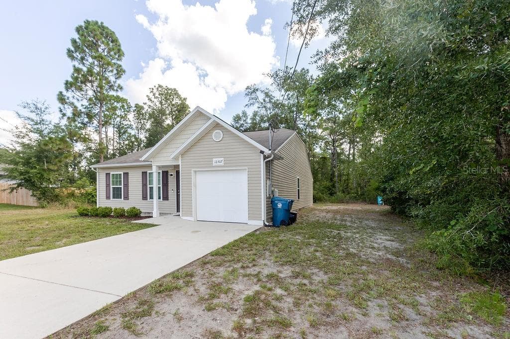 12307 MILLINGTON AVENUE, WEEKI WACHEE, FL 34614 — zdjęcie 4