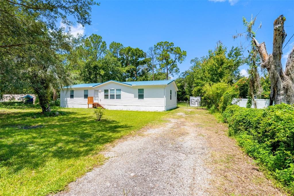 6847 WOODSMAN DRIVE, WESLEY CHAPEL, FL 33544