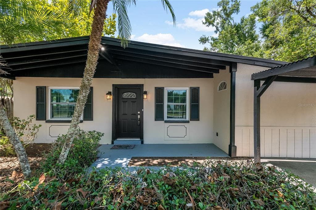 7402 WISHING WELL COURT, TAMPA, FL 33619 — zdjęcie 4