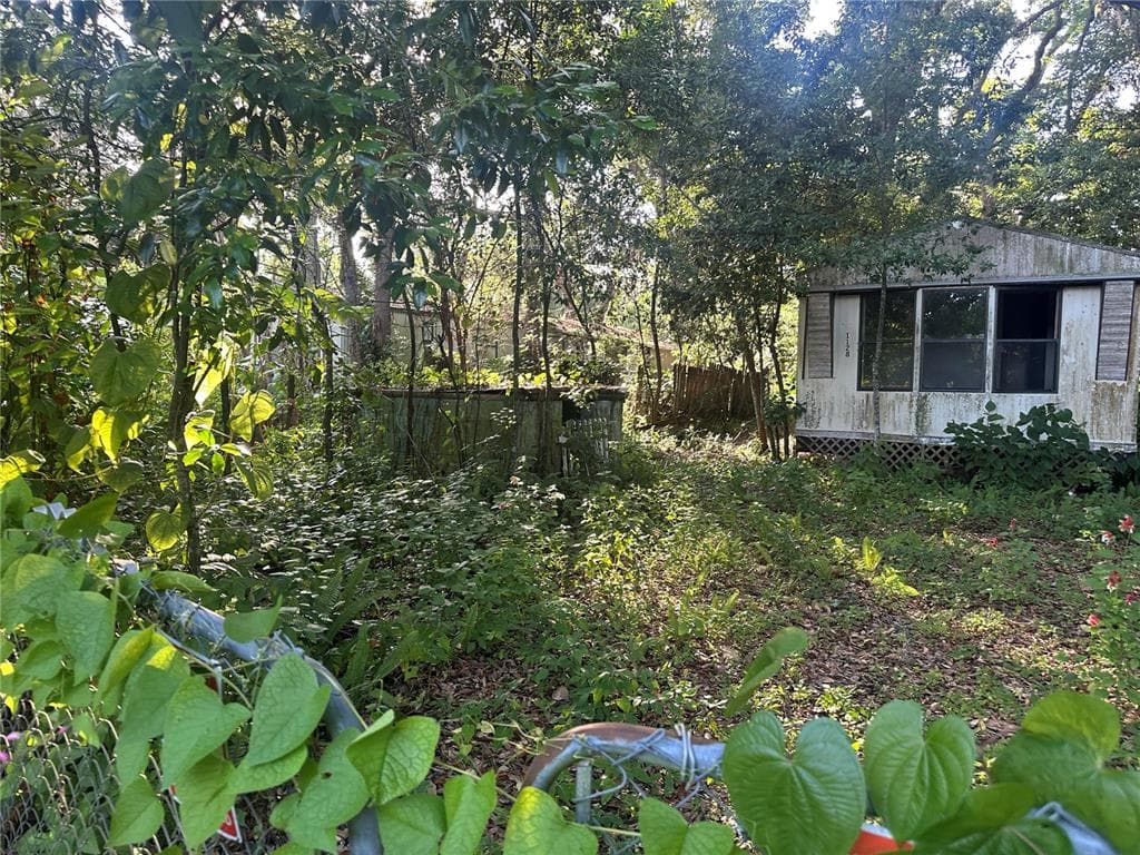 1128 N JACKSON AVENUE S, SPRING HILL, FL 34604 — zdjęcie 3