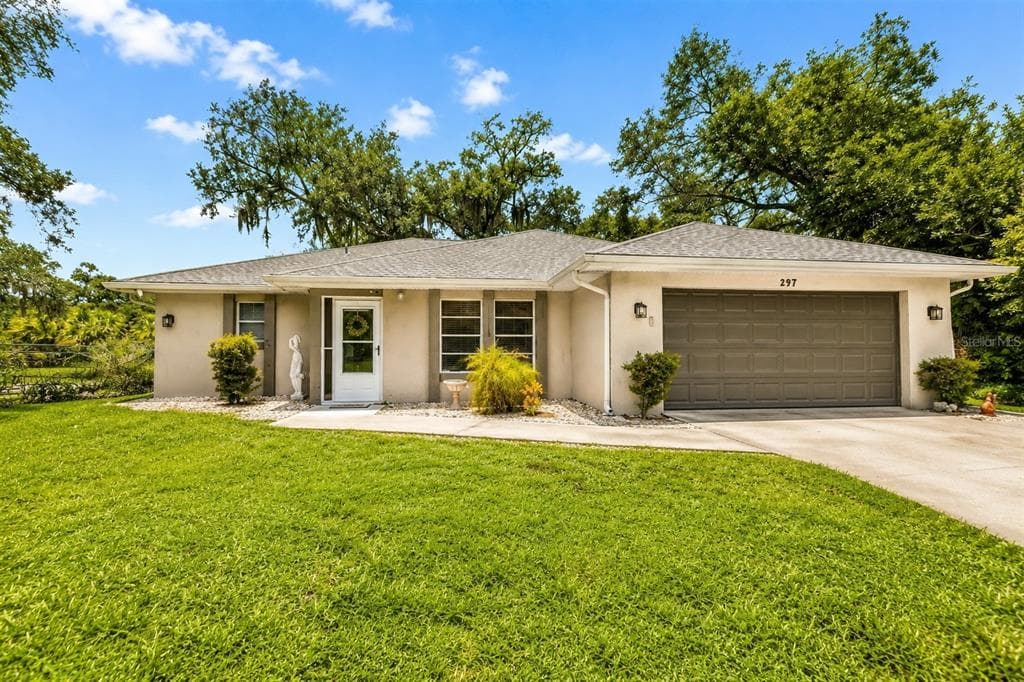 297 FLAMINGO BOULEVARD, PORT CHARLOTTE, FL 33954