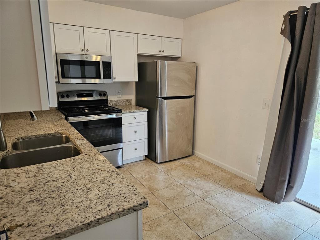 7626 GOLDEN GLENN DRIVE, ORLANDO, FL 32807 — zdjęcie 4
