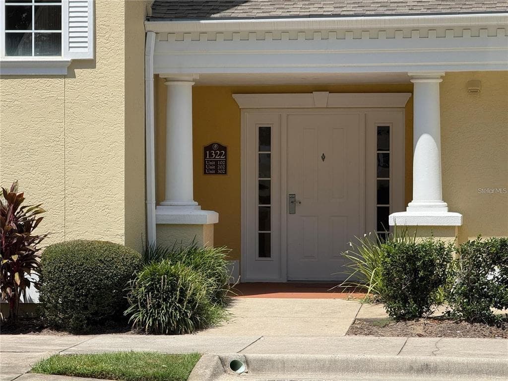 1322 SEVEN EAGLES COURT # 102, REUNION, FL 34747