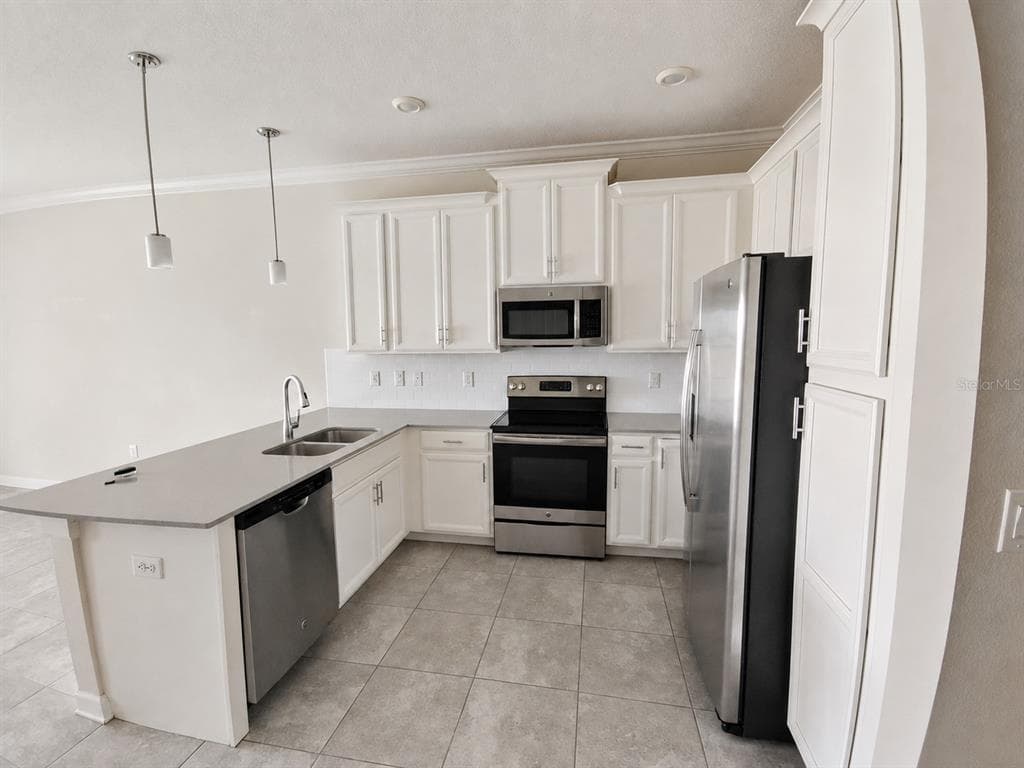 1348 ROYAL ST GEORGE BOULEVARD, DAVENPORT, FL 33896 — zdjęcie 4