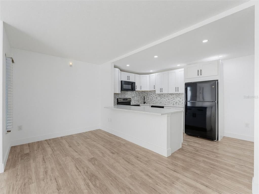 1261 PINE RIDGE CIRCLE W # D1, TARPON SPRINGS, FL 34688 — zdjęcie 4