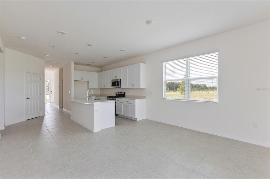 9128 WILDLIGHT TRAIL, WILDWOOD, FL 34785 — zdjęcie 4