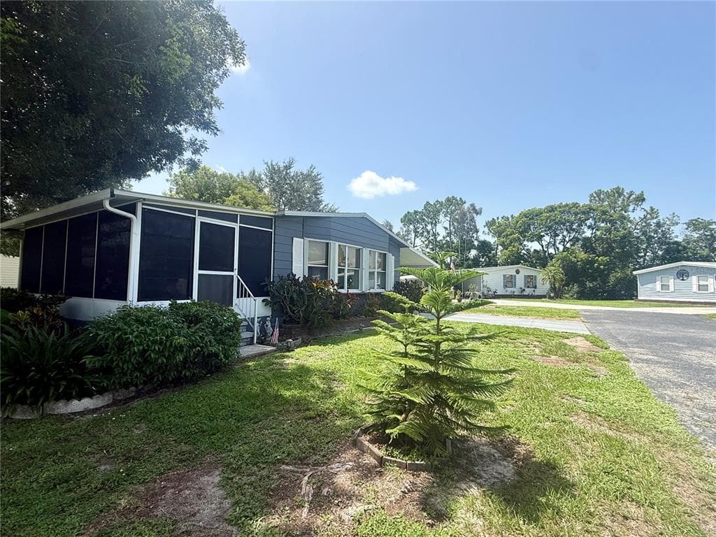 9735 LAKE FAIRWAYS BOULEVARD, NORTH FORT MYERS, FL 33903 — zdjęcie 2