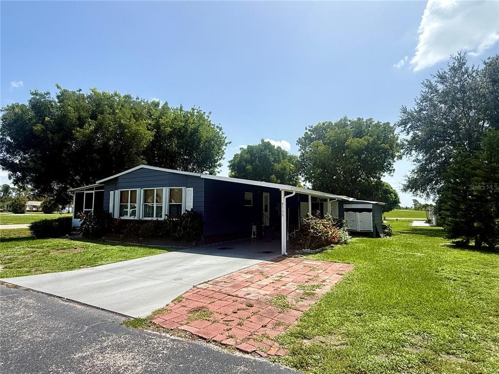 9735 LAKE FAIRWAYS BOULEVARD, NORTH FORT MYERS, FL 33903 — zdjęcie 3