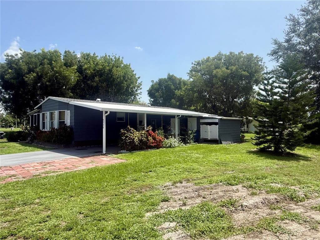 9735 LAKE FAIRWAYS BOULEVARD, NORTH FORT MYERS, FL 33903 — zdjęcie 4