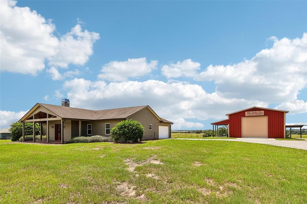 3670 LAKE HATCHINEHA ROAD, HAINES CITY, FL 33844