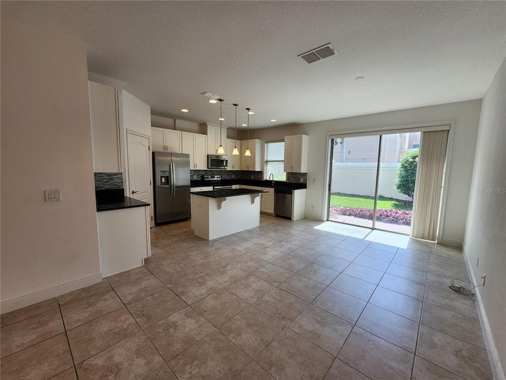 9805 WINNINGTON STREET, ORLANDO, FL 32832 — zdjęcie 4