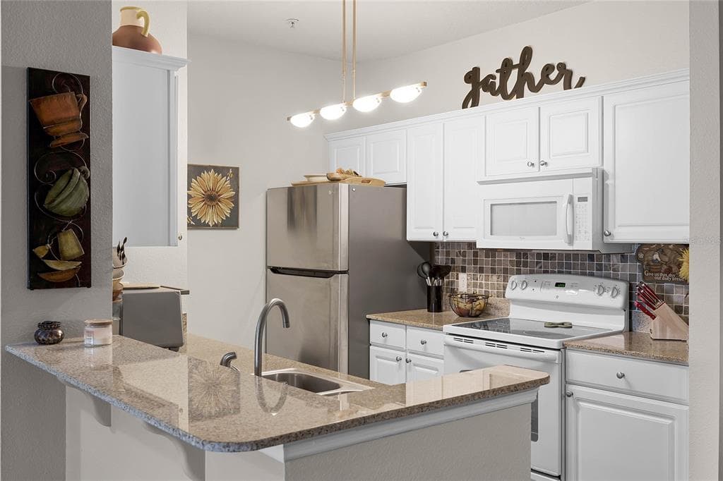 430 SOUTHERN PECAN CIRCLE # 207, WINTER GARDEN, FL 34787