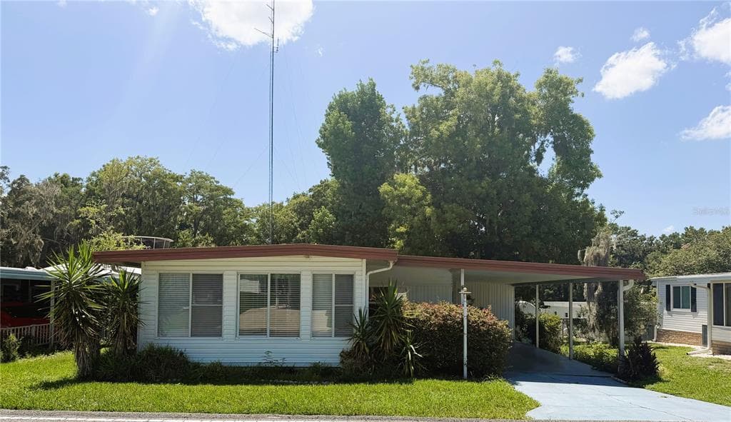 203 ASPEN CIRCLE, LEESBURG, FL 34748