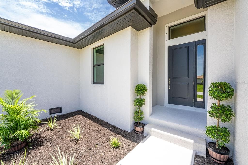 9590 HONEYMOON DRIVE, PORT CHARLOTTE, FL 33981 — zdjęcie 3